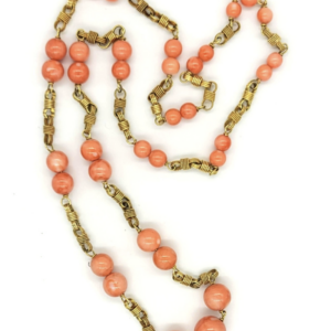 Beaded coral long necklace with braided and smooth links