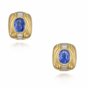 Bulgari diamond and sapphire geometric ear clips in 18k gold centering two oval-shaped sapphires