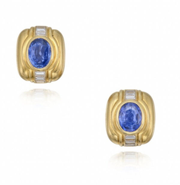 Bulgari diamond and sapphire geometric ear clips in 18k gold centering two oval-shaped sapphires