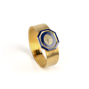 Collectible Piaget 18K Yellow Gold and Lapis Lazuli Watch of Geometrical Design, accented by pavè diamonds on the dial