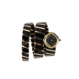 Rare Bulgari 18k gold and black enamel Serpenti Tubogas watch with a rhomboid face, carrying an automatic movement
