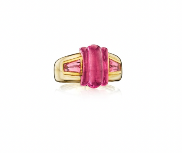 Bulgari tourmaline ring in 18k gold, set with a fluted cabochon tourmaline, and pink tourmaline shoulders.  Made in Italy, circa 1985.