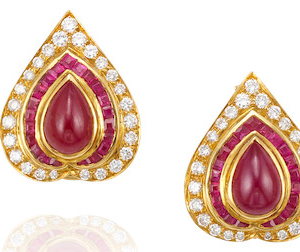 Cabochon pear shaped ruby and diamond earrings in gold. Made in Italy, circa 1980.