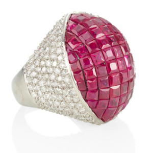 18k white gold cocktail ring in a dome design, centering invisible set rubies, accented by round diamonds weighing approximately 2.40 carats. Made in Italy, circa 1980.