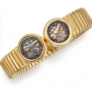 Bulgari Tubogas Monete double coin cuff bracelet. Made in Italy, circa 1980. Coin Euboea Histiaea 3rd century Italian AR Tetrobol. 196-146 BC. Head of the nymph Histiaea right, wreathed with vine, hair rolled up.