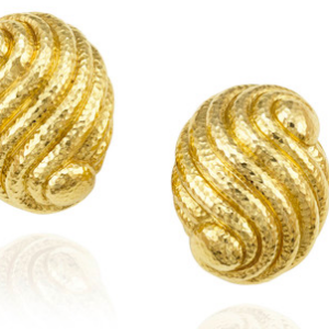 Hammered swirl earrings in 18k gold by David Webb. Made in. America, circa 1970.