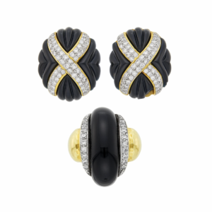 Ring and earrings with carved onyx and 1.50 carats of diamonds in 18k gold. Made in America, circa 1960.