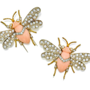 A chic pair of 18k yellow gold with 3.90 carats of diamonds, and coral bumblebee dress clips by Nardi of Venice